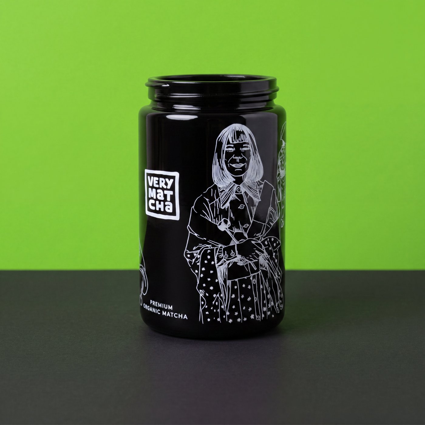 Schwarze Glasdose mit weißer Siebdruck-Illustration